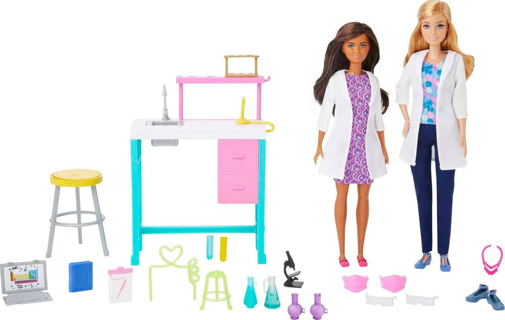 Science doll playset with lab bench, two dolls, and science accessories laid out