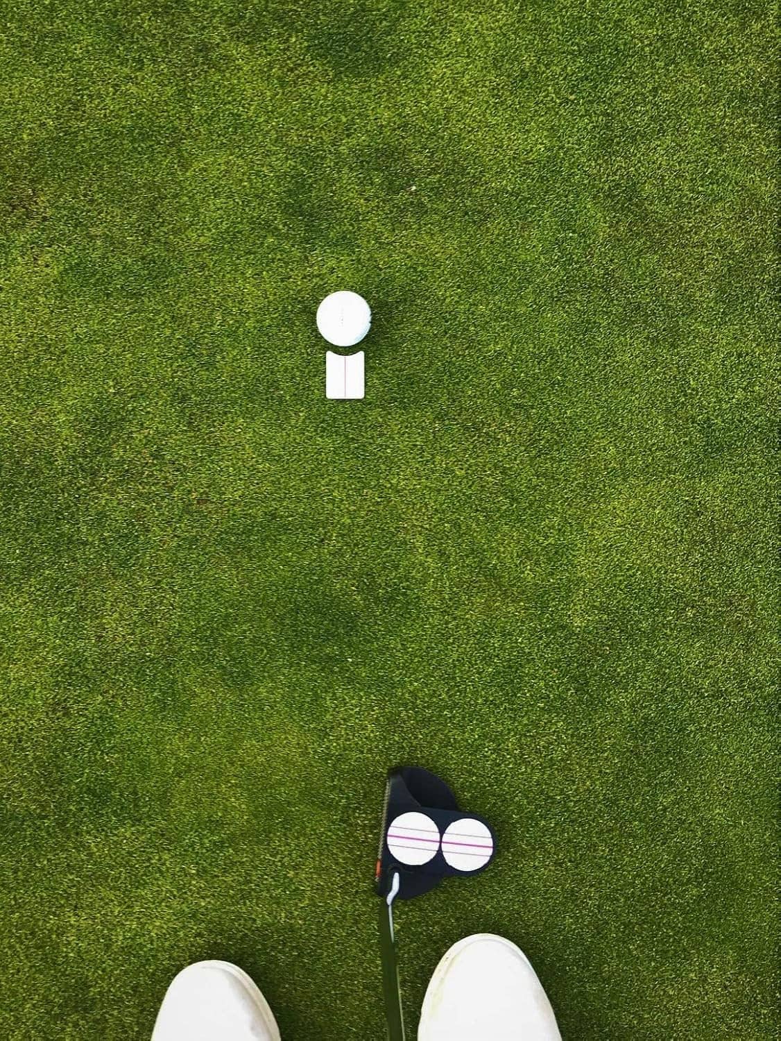 White round ball marker with centered dot