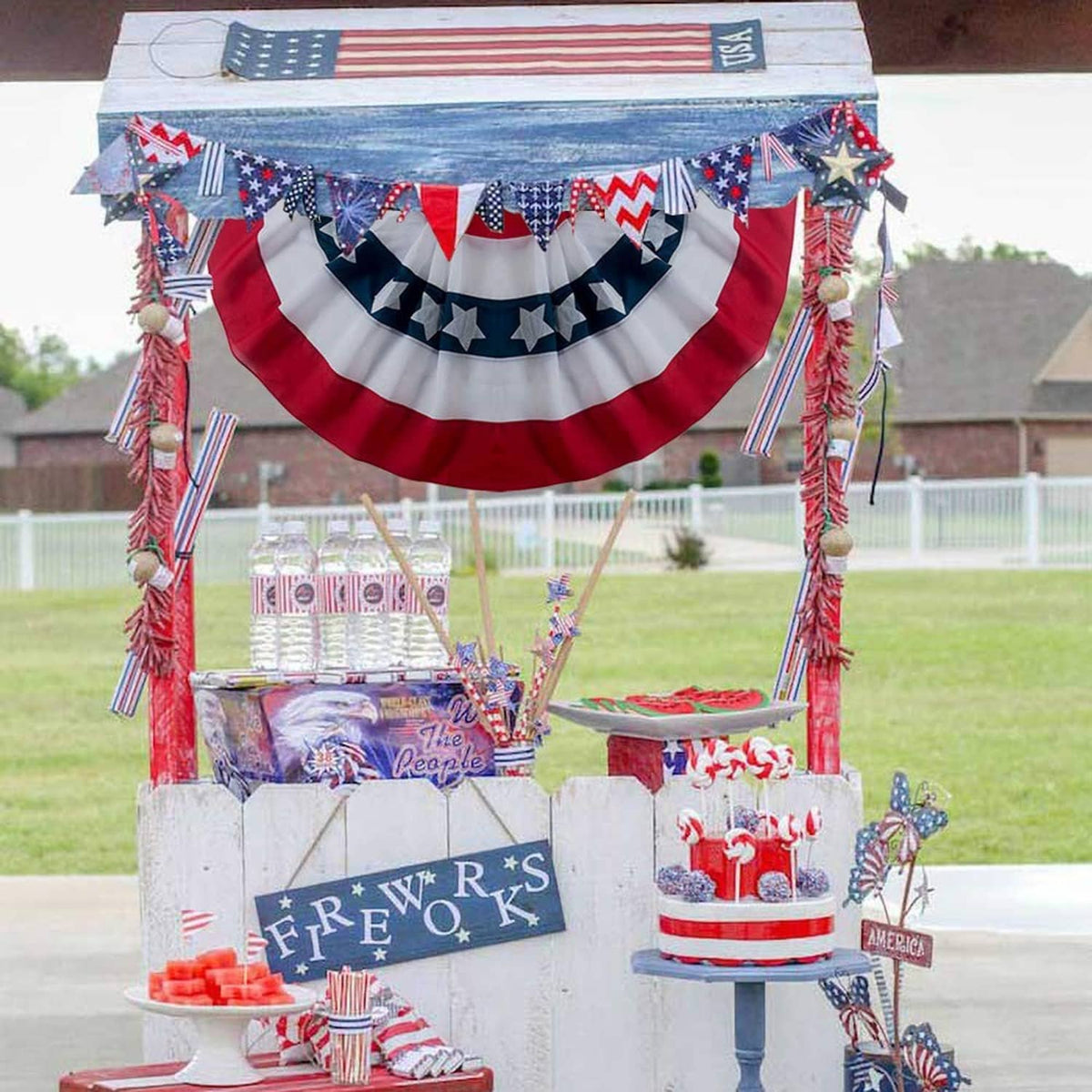 Patriotic pleated fan bunting flag banner with star-and-stripe fabric and tassel ends