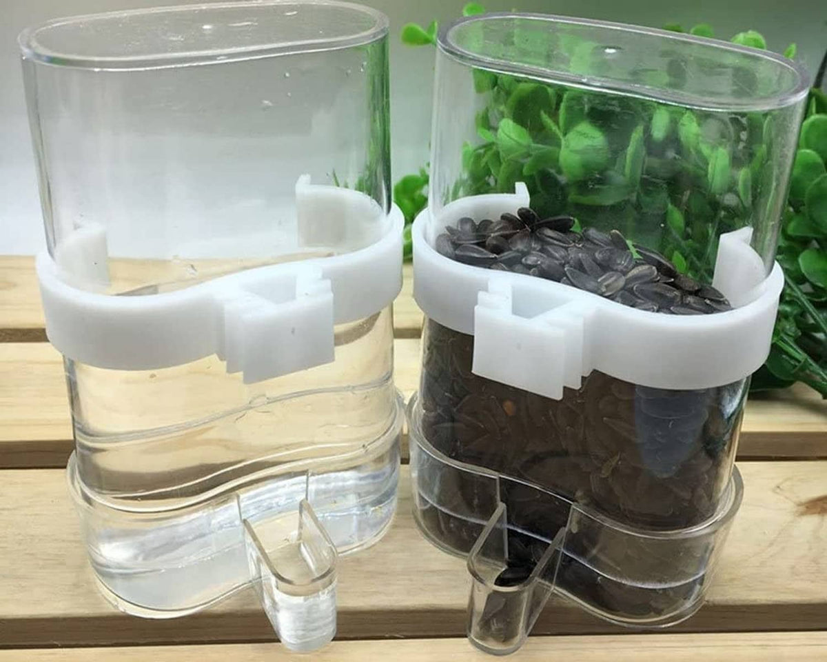 Clear automatic bird waterer pair with white brackets, one for seeds, one for water