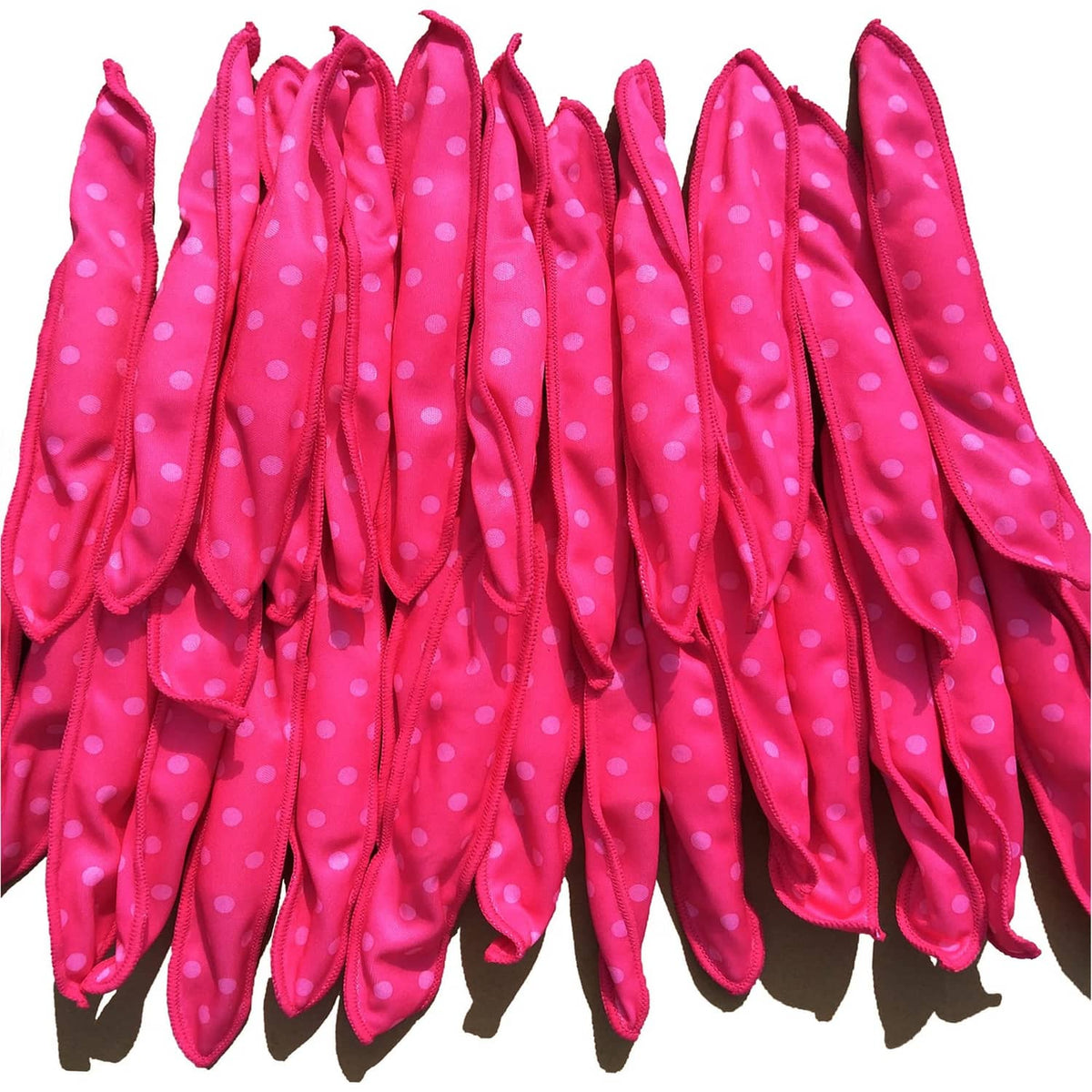 Pink polka-dot soft sponge hair curlers, multiple zip-up rollers