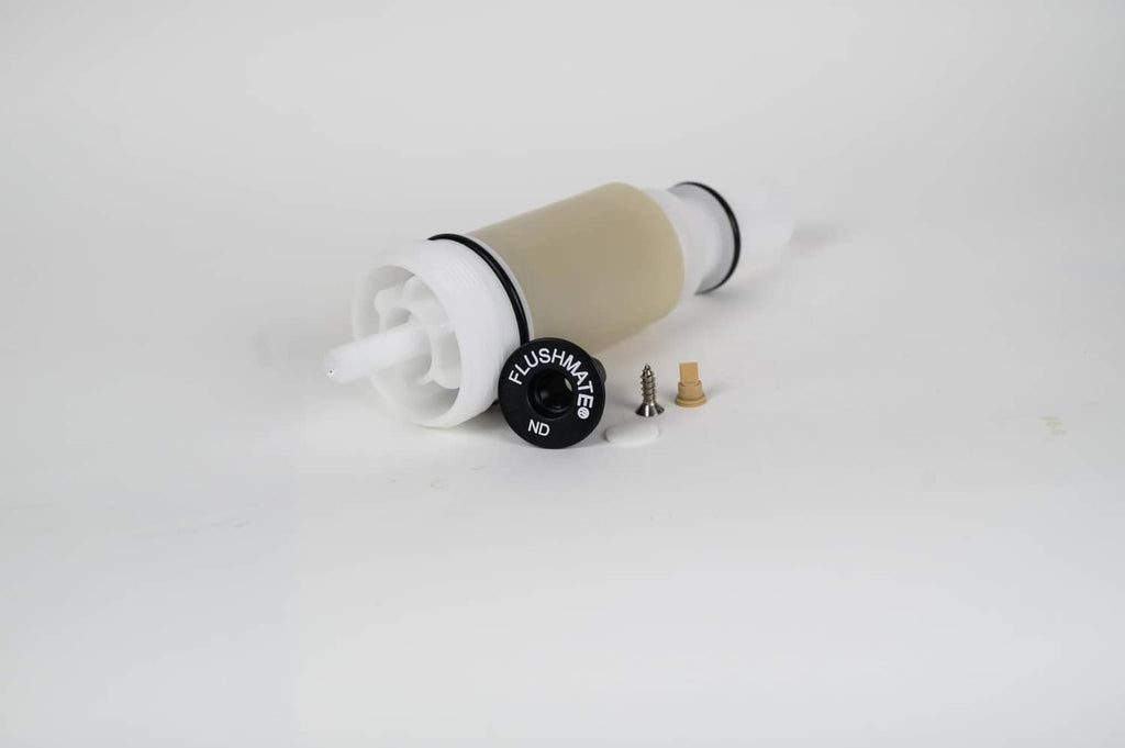 Flushmate flush valve cartridge with beige housing, white nozzle, and included screws