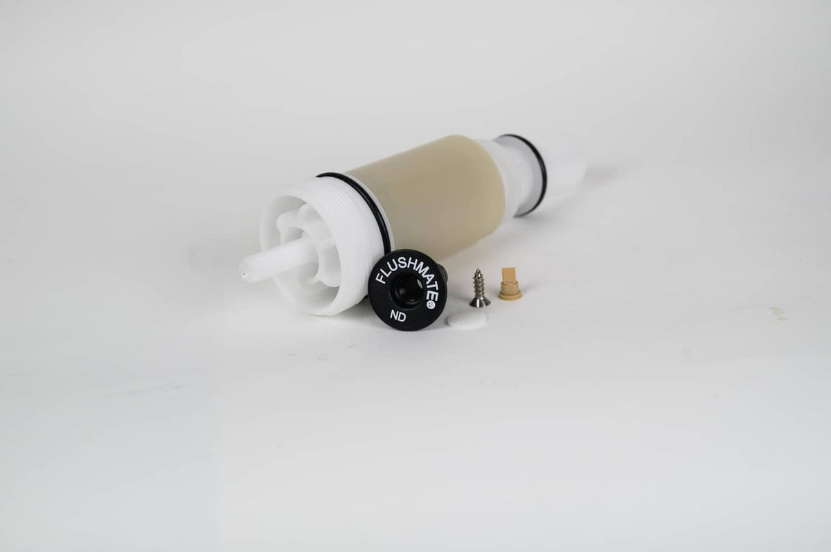 Flushmate flush valve cartridge with beige housing, white nozzle, and included screws