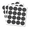 Round black felt furniture pads on backing sheets, textured non-slip surface