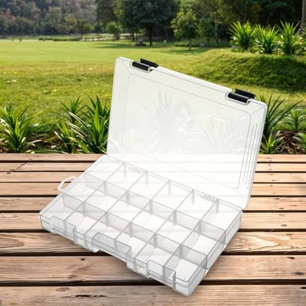 Clear plastic tackle organizer box with removable divider grid and black latch handles