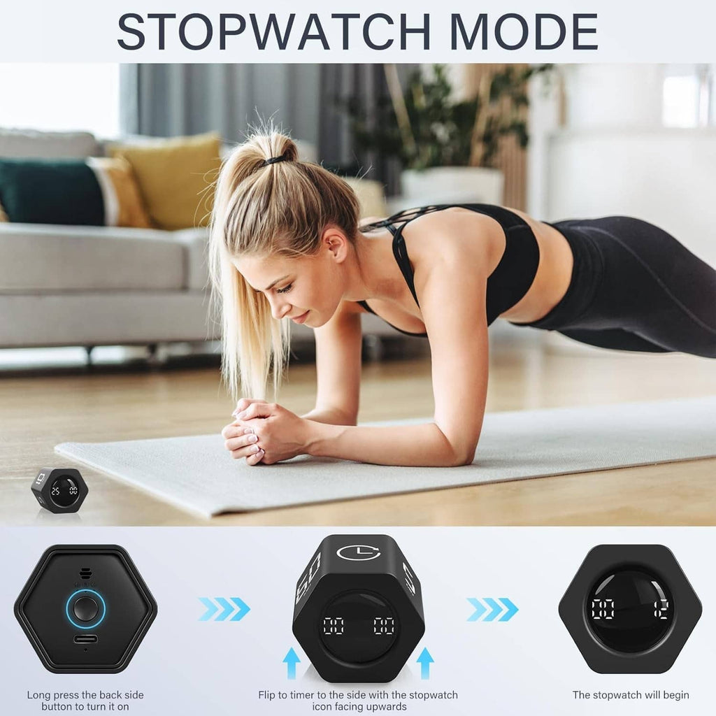 Black stopwatch mode timer near a stretching woman, with bright digital time display