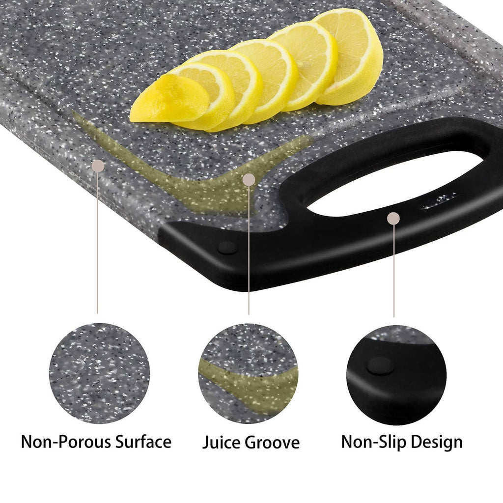 Gray speckled cutting board with black non-slip base, juice groove, and lemon slices
