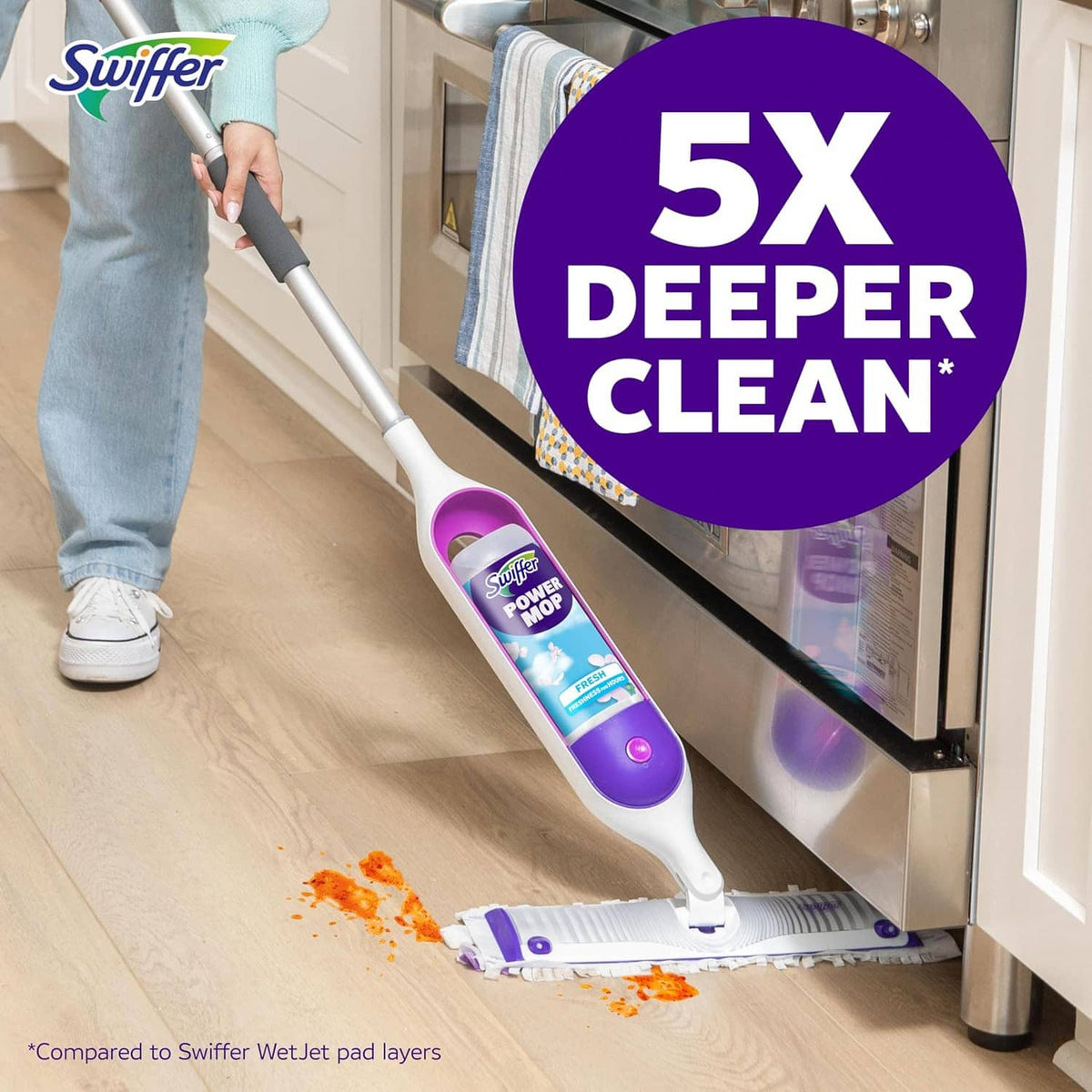 Swiffer Power Mop moving along floor with replacement pad under the handle