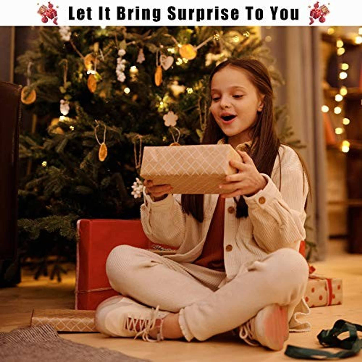 Woman sitting and holding a wrapped gift box for a holiday celebration