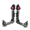 Front bumper mount bracket retainer pair, black plastic with round bearing openings and pink pins