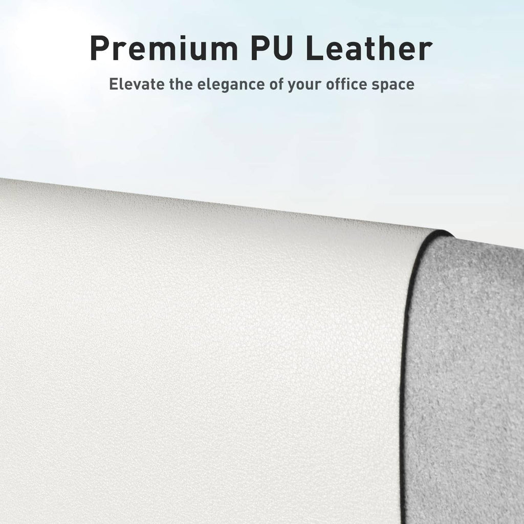 Off-white desk pad protector corner with smooth PU leather texture and folded edge.