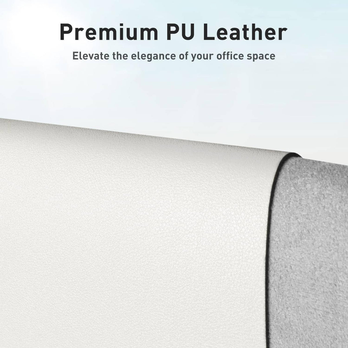 Off-white desk pad protector corner with smooth PU leather texture and folded edge.