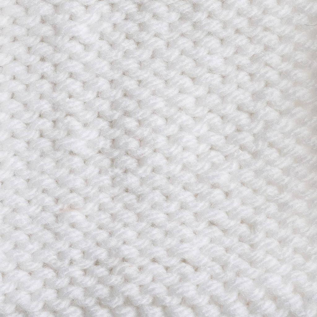 White knit fabric texture with small repeating stitch pattern