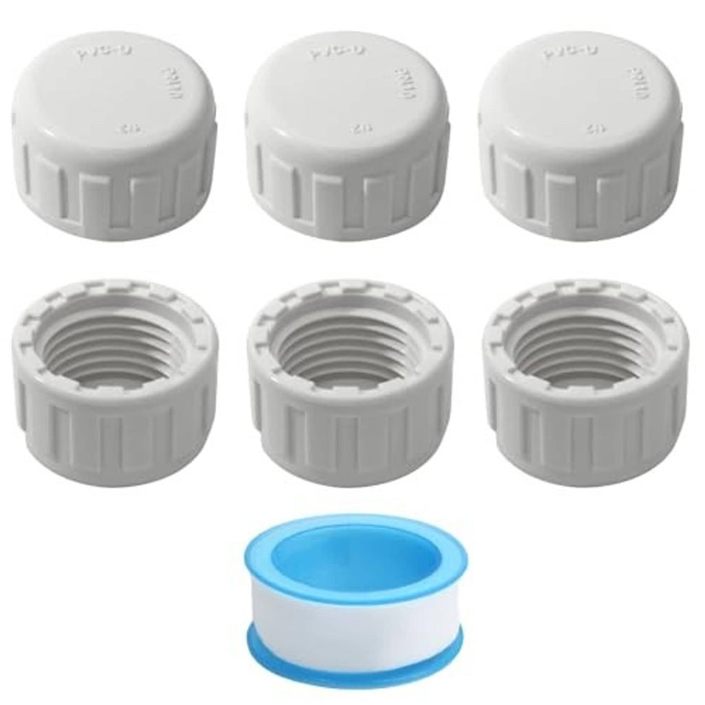 Set of 6 white PVC pipe end caps with internal threads, one includes blue seal ring