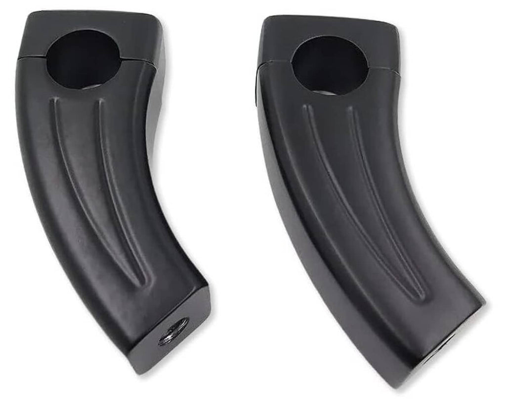 Black handlebar riser block pair with circular opening and sculpted grip channel