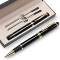 Black luxury ballpoint pen with gold accents, shown in a gift box set
