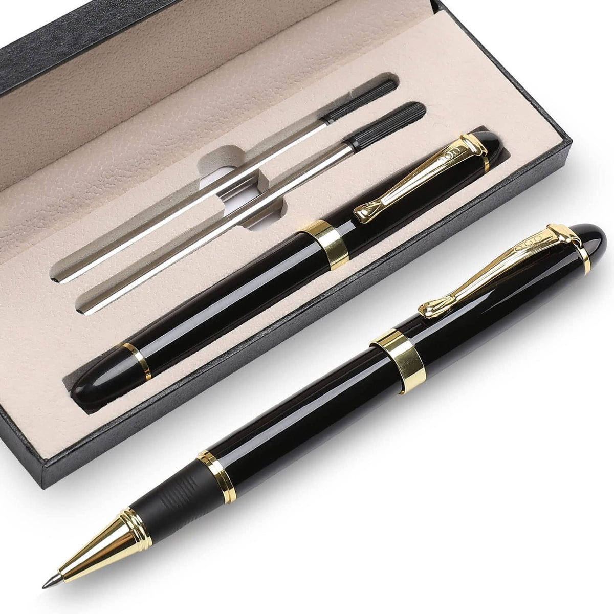 Black luxury ballpoint pen with gold accents, shown in a gift box set