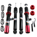 Coilover strut set with black shocks, red collars, and black front rear springs