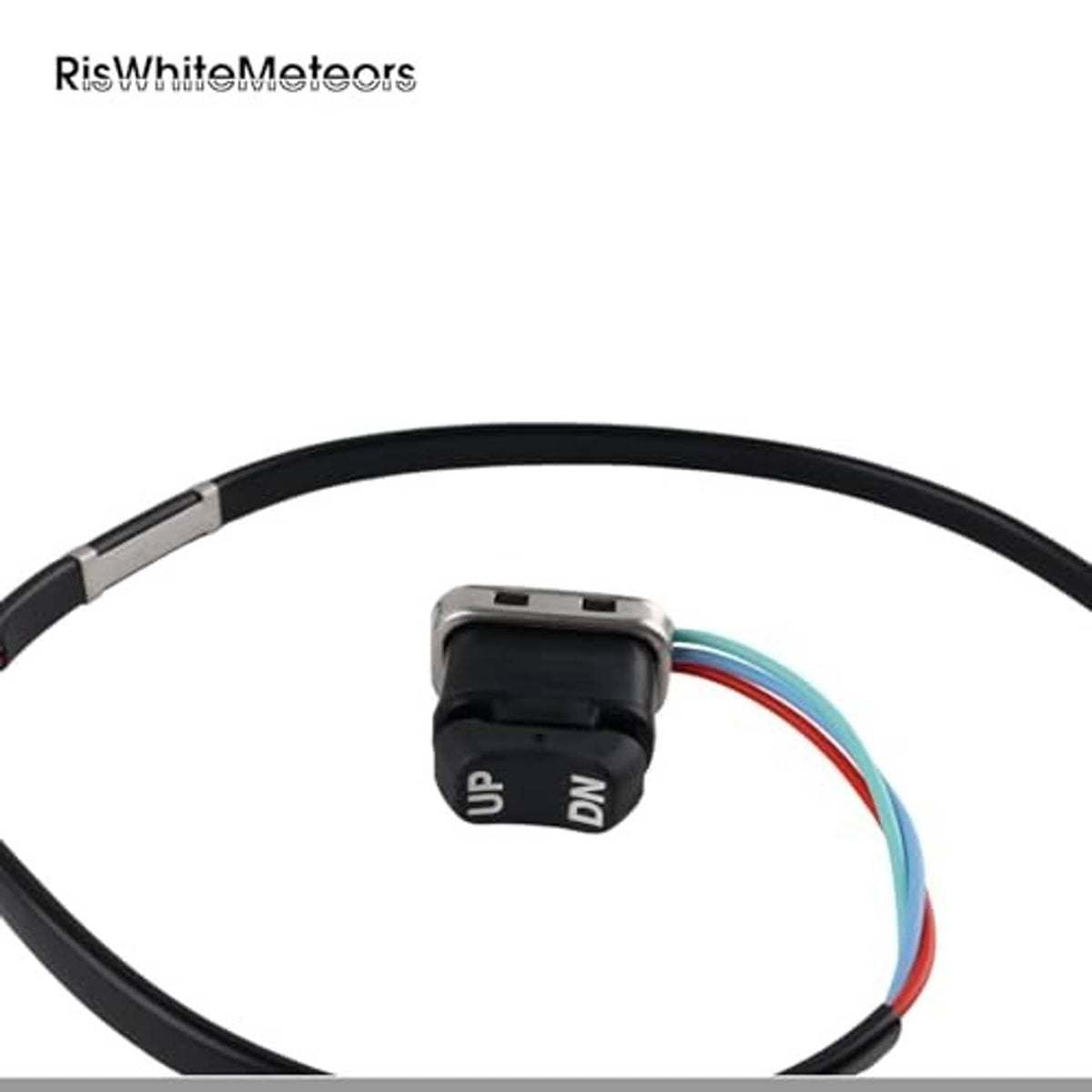 Close-up of tilt switch module on black wire harness with colored leads