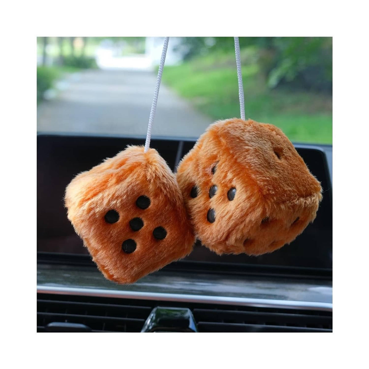 Brown fuzzy plush dice with black dot faces, hanging pair on strings