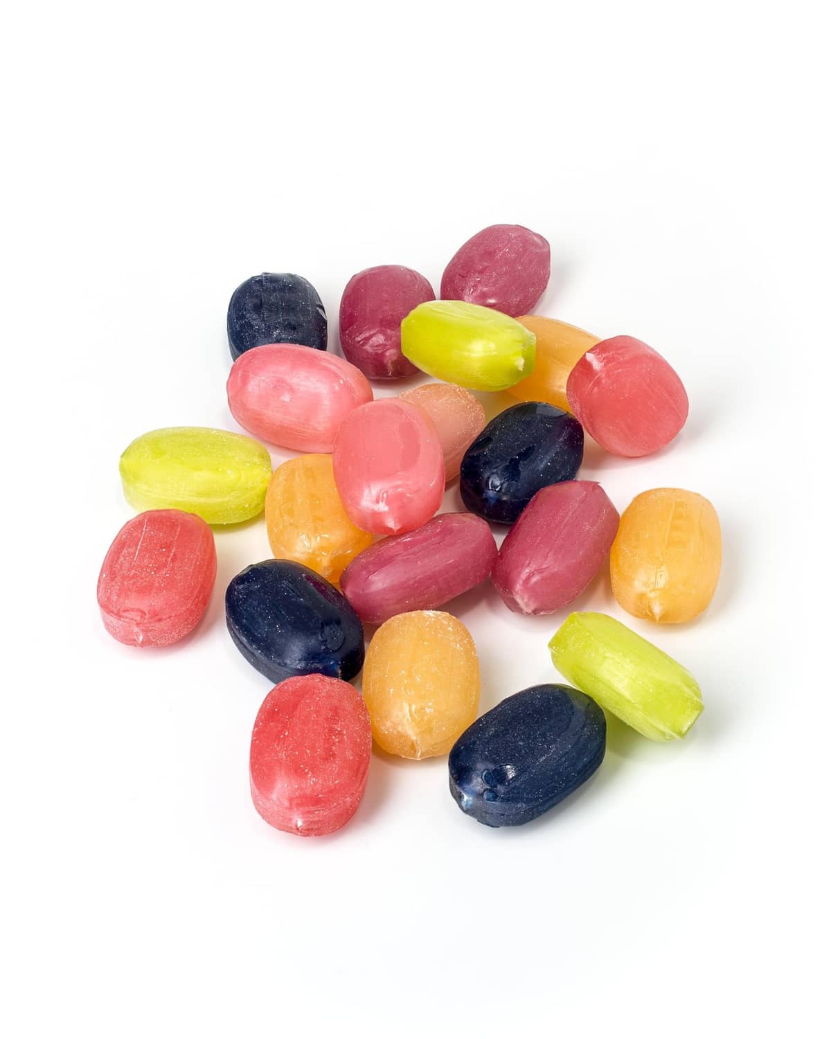 Assorted oval hard candy pieces in red, blue, yellow, green, and orange