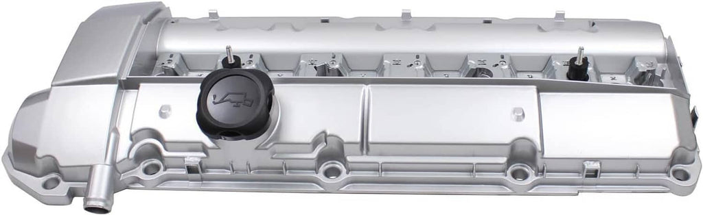 Silver valve cover interior with oil cap opening and small support brackets