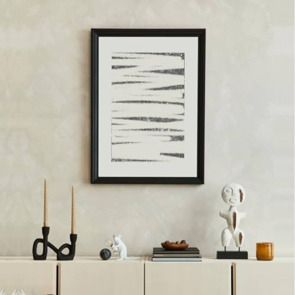 Black picture frame with front glass, slim border around a minimalist print