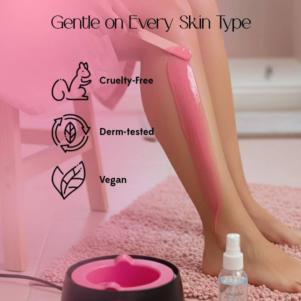 KoluaWax wax warmer on a user’s leg with cruelty-free, derm-tested, and vegan icons