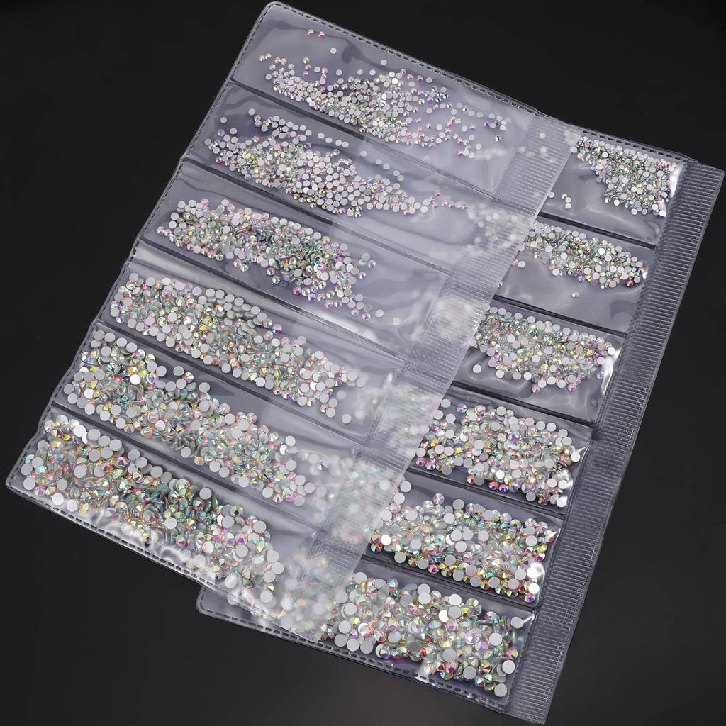 Clear rhinestone storage organizer with compartments, filled with round AB flat-back gems.