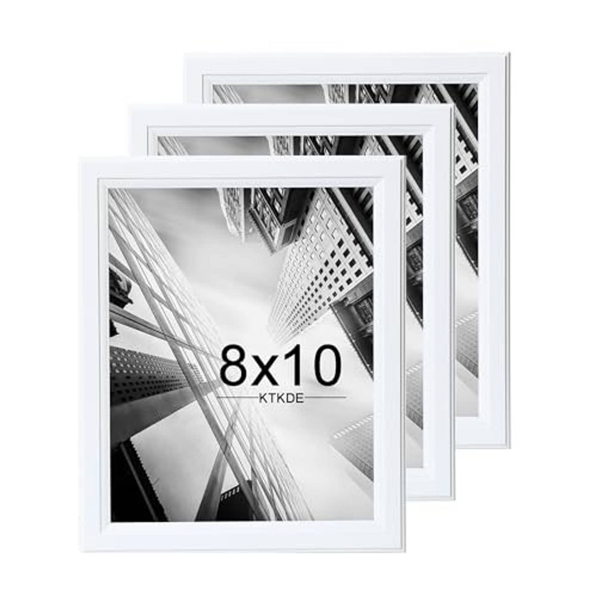 Set of 3 white wooden 8x10 picture frames, angled stack showing front openings