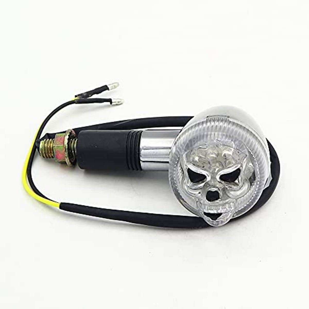 Skull-shaped motorcycle turn signal light with clear lens, chrome body, black cable, plugs