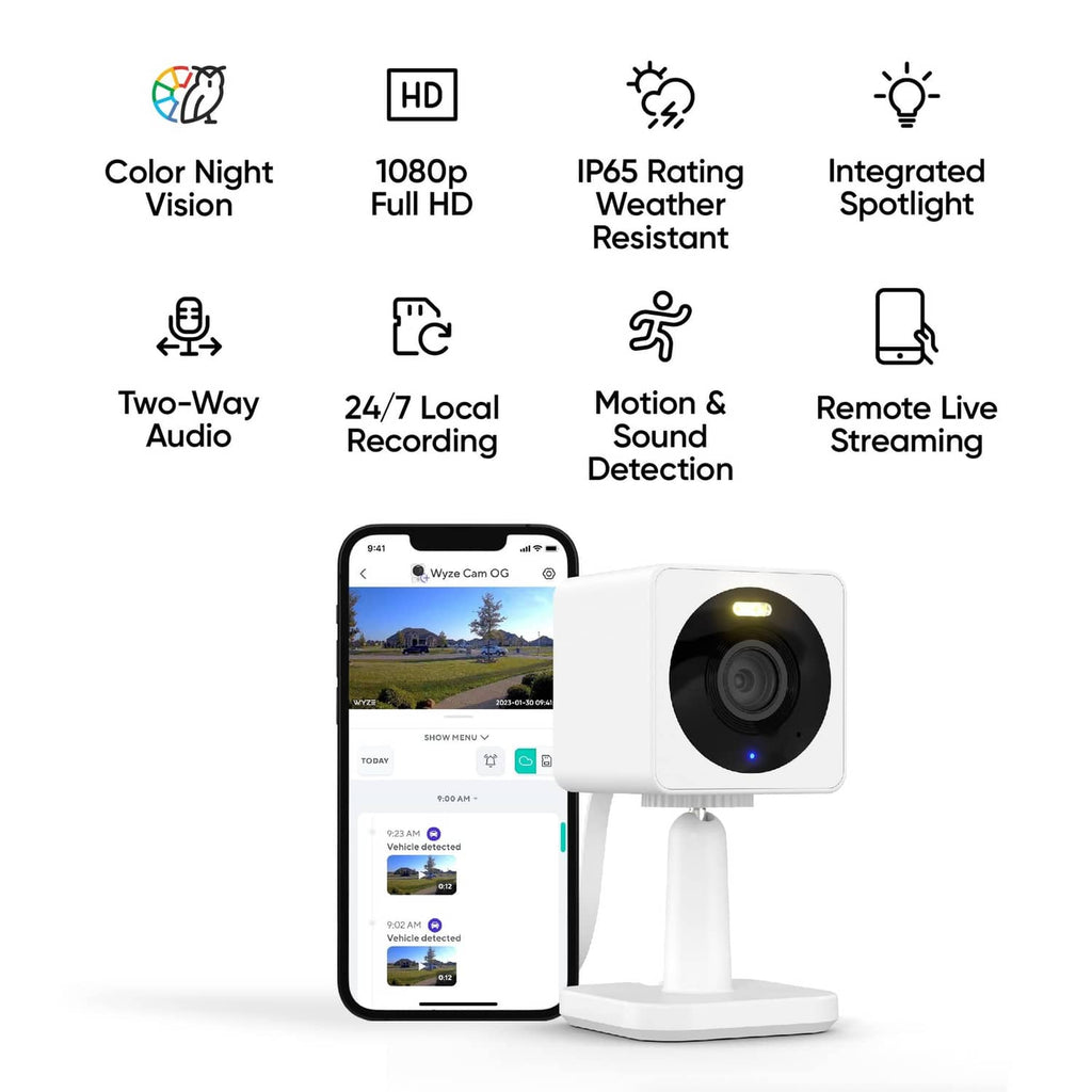 White security camera on desktop stand with visible lens and indicator lights