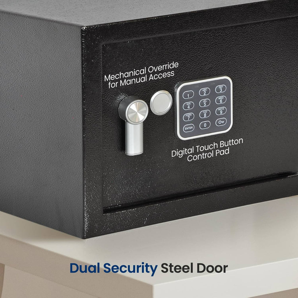 Black safe door with touch keypad, manual override dial, and silver handle