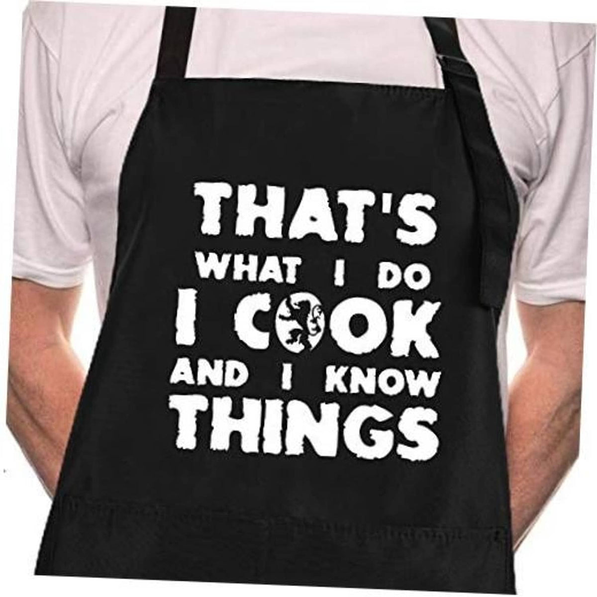 Black chef apron with bold white slogan text and small chef graphic