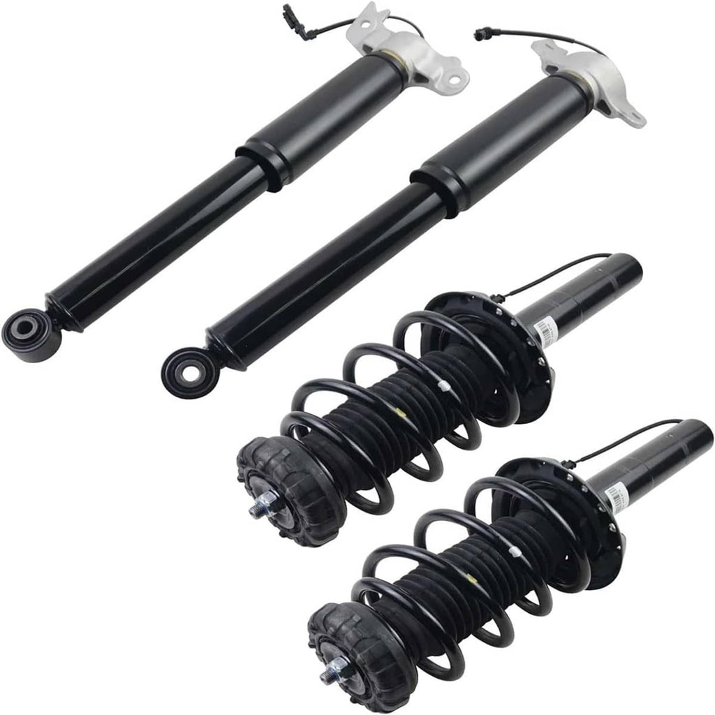 Complete shock strut and spring set with black dampers, coil springs, and mounting plates
