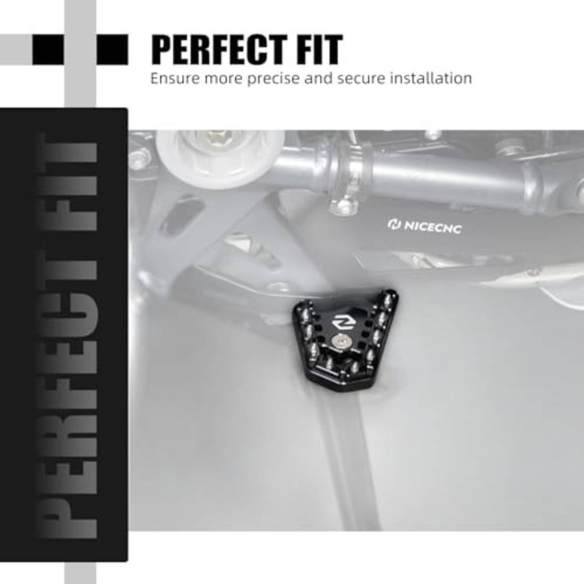 Black brake footboard mounted on motorcycle with N logo and bolt holes
