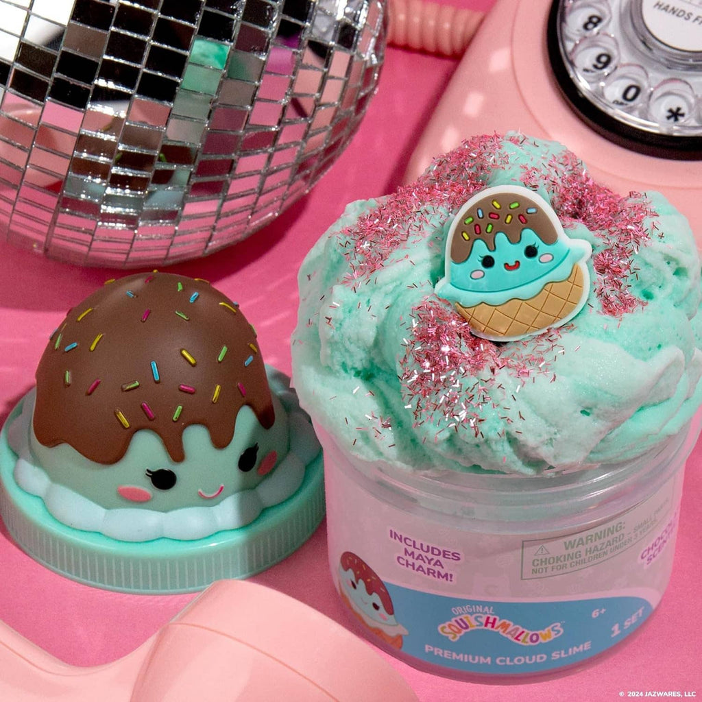 Two teal cloud slime jars with ice-cream character lids and pink silver sprinkle tops