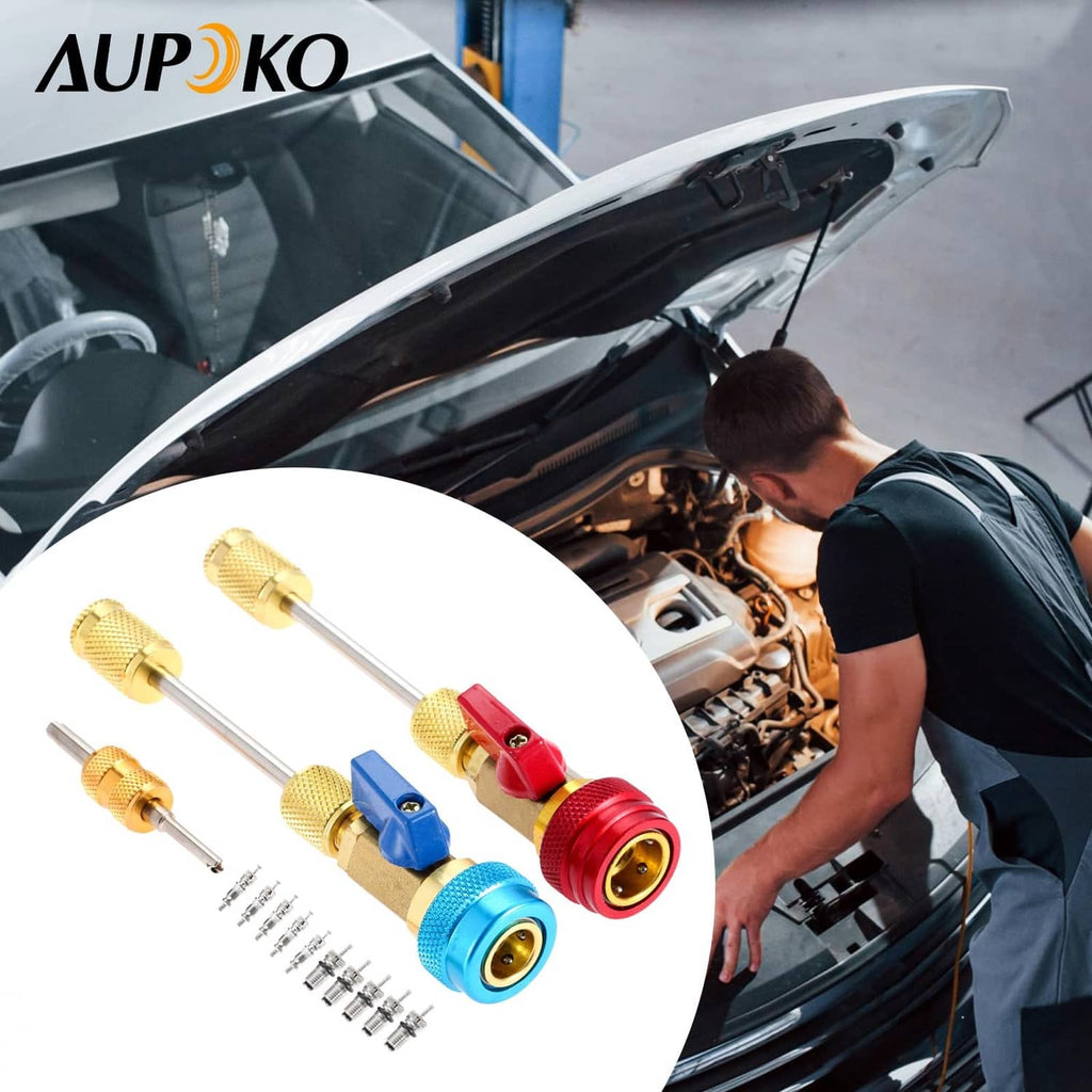 R134A valve core remover/installer kit used on a car engine bay with red and blue ends
