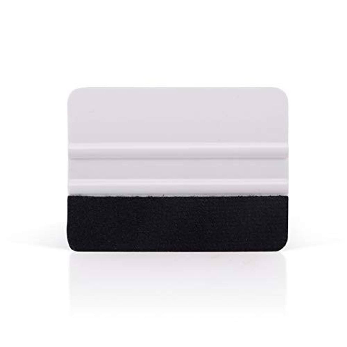 Close-up of vinyl squeegee: white plastic scraper with black felt pad