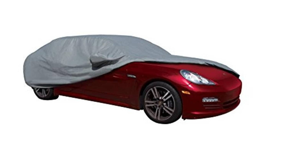 Black vinyl tire guard cover fitted over a car front wheel and hood area
