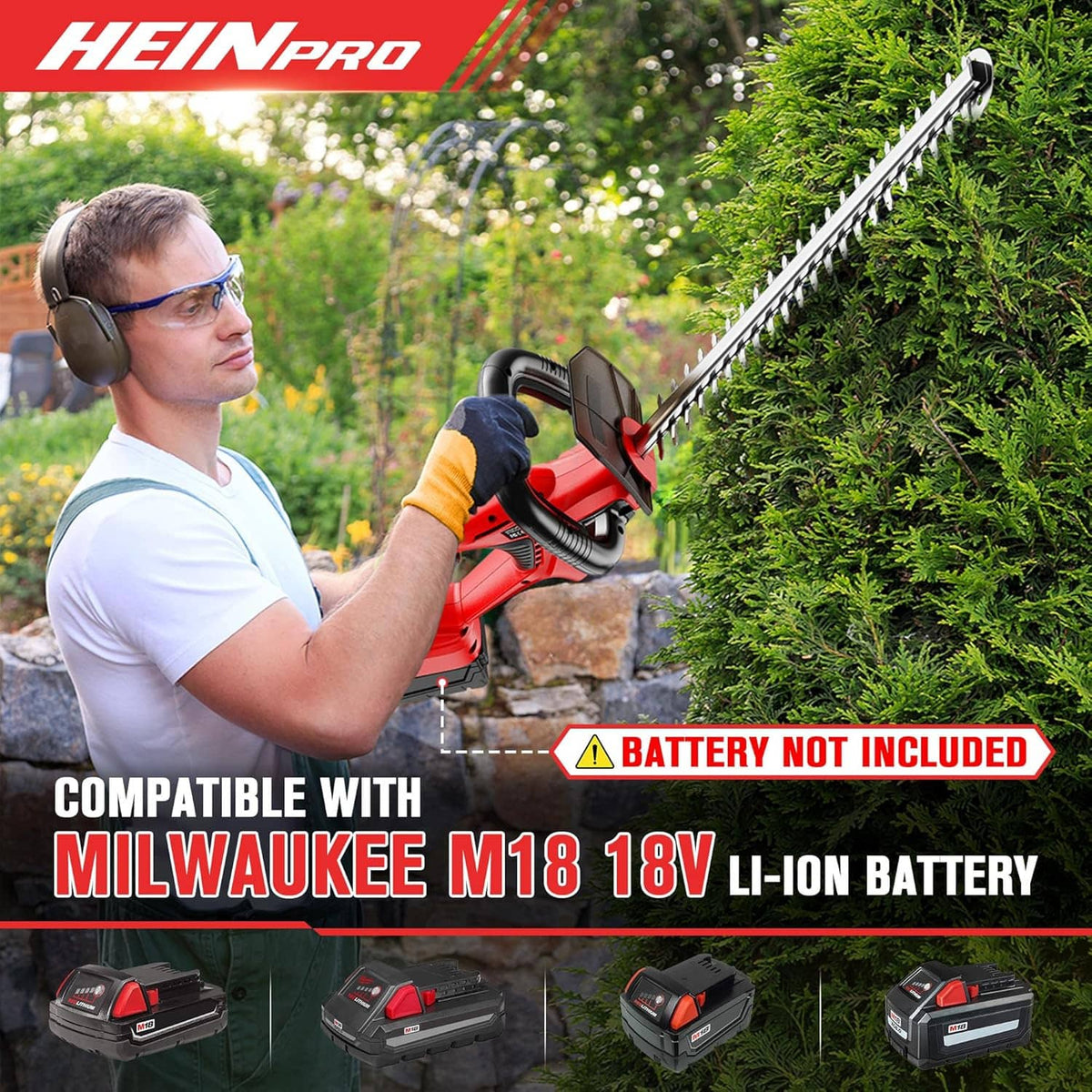 Person using red cordless hedge trimmer to trim dense green hedge outdoors