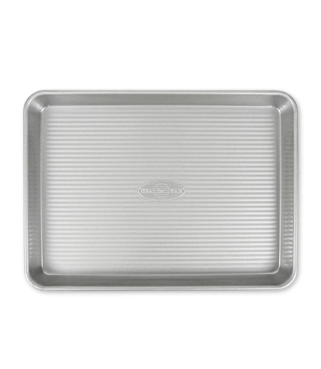 Aluminized steel quarter sheet baking pan with nonstick ridged interior and rim