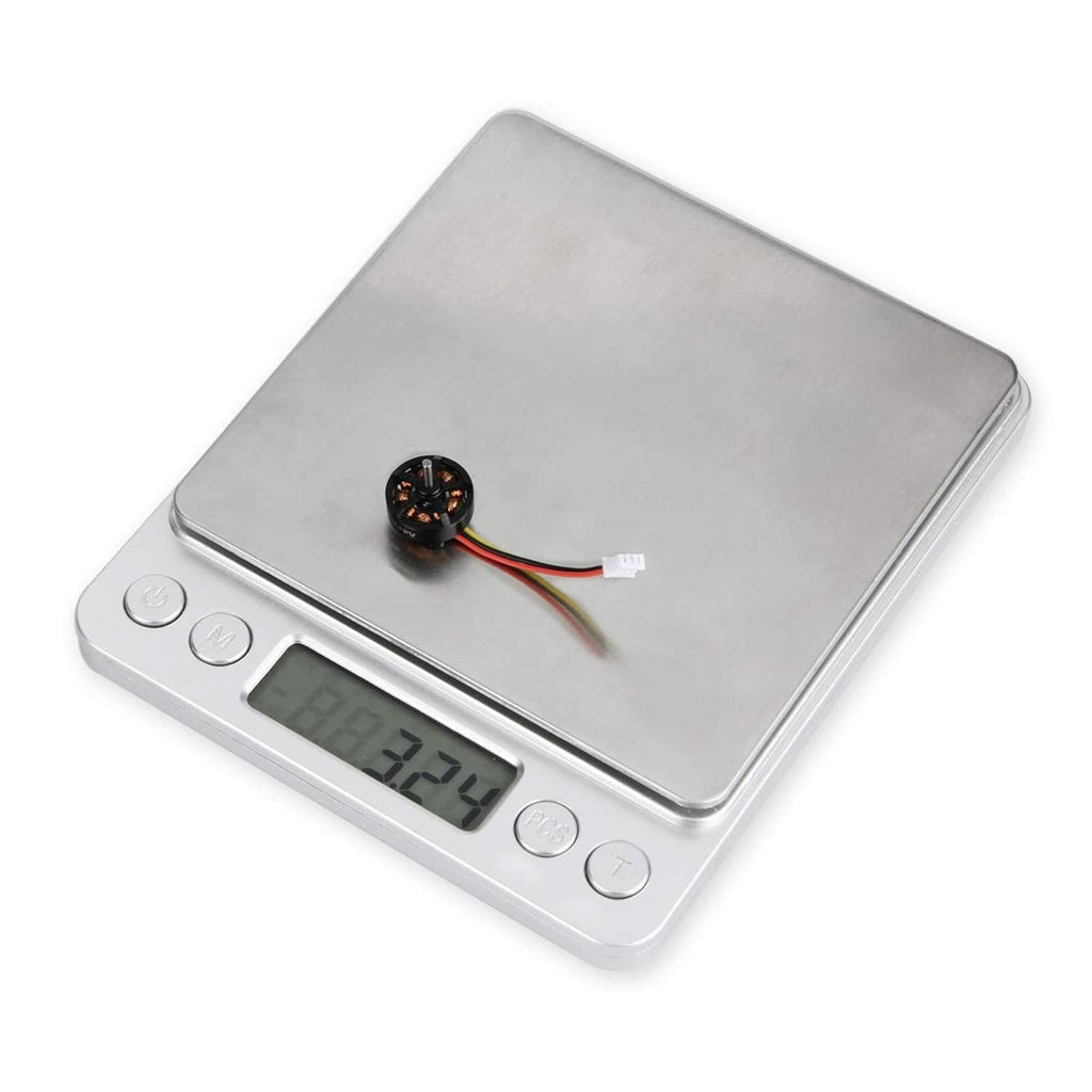 1103 brushless FPV motor on a digital scale, shows weight
