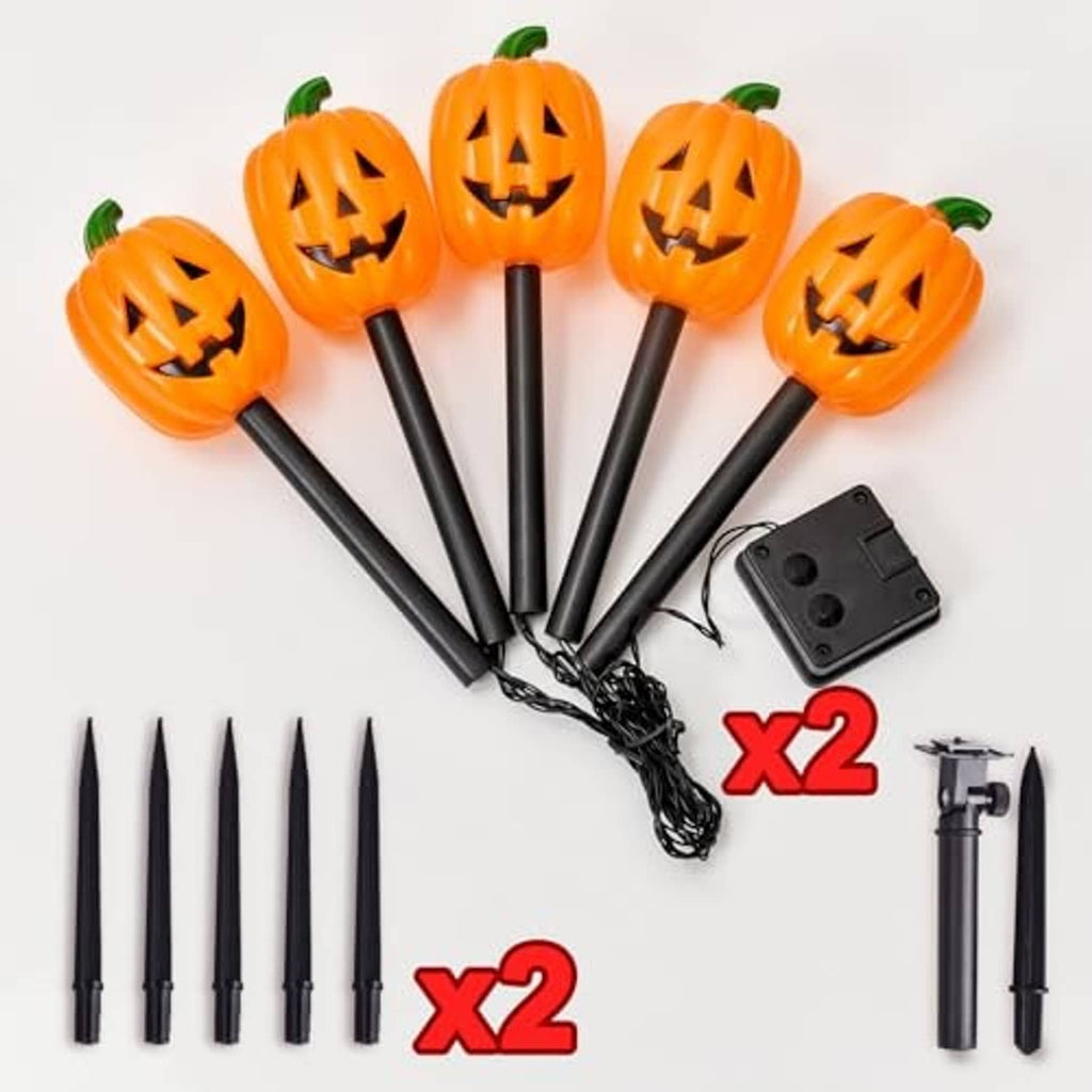 Jack-o'-lantern pumpkin stake light set with black stakes and solar panel