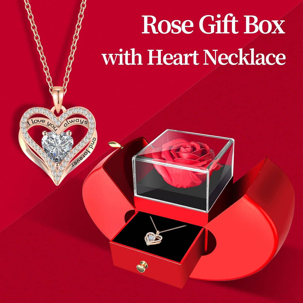 Heart pendant necklace beside preserved red rose in clear gift box with open drawer