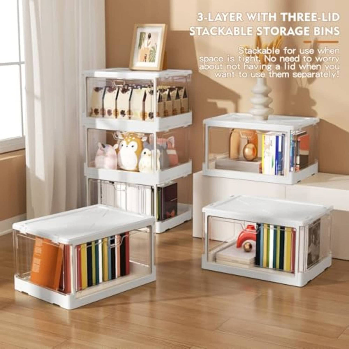 Set of white collapsible storage bins with lids, stacked for organizing items