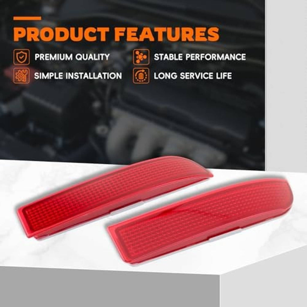 Two red rear bumper reflector covers with raised textured pattern