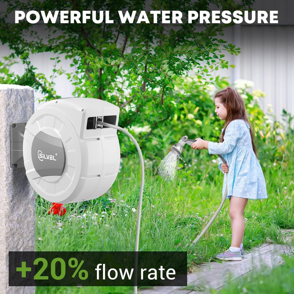 Wall-mounted hose reel spraying water from the connected nozzle