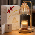 Amber glass candle warmer lamp with ribbed shade on gold-tone stand and wooden base