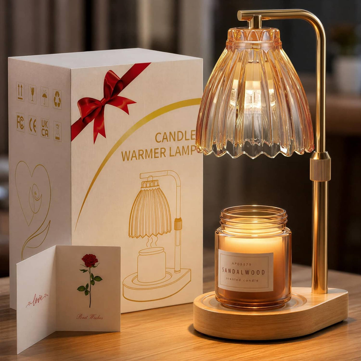 Amber glass candle warmer lamp with ribbed shade on gold-tone stand and wooden base